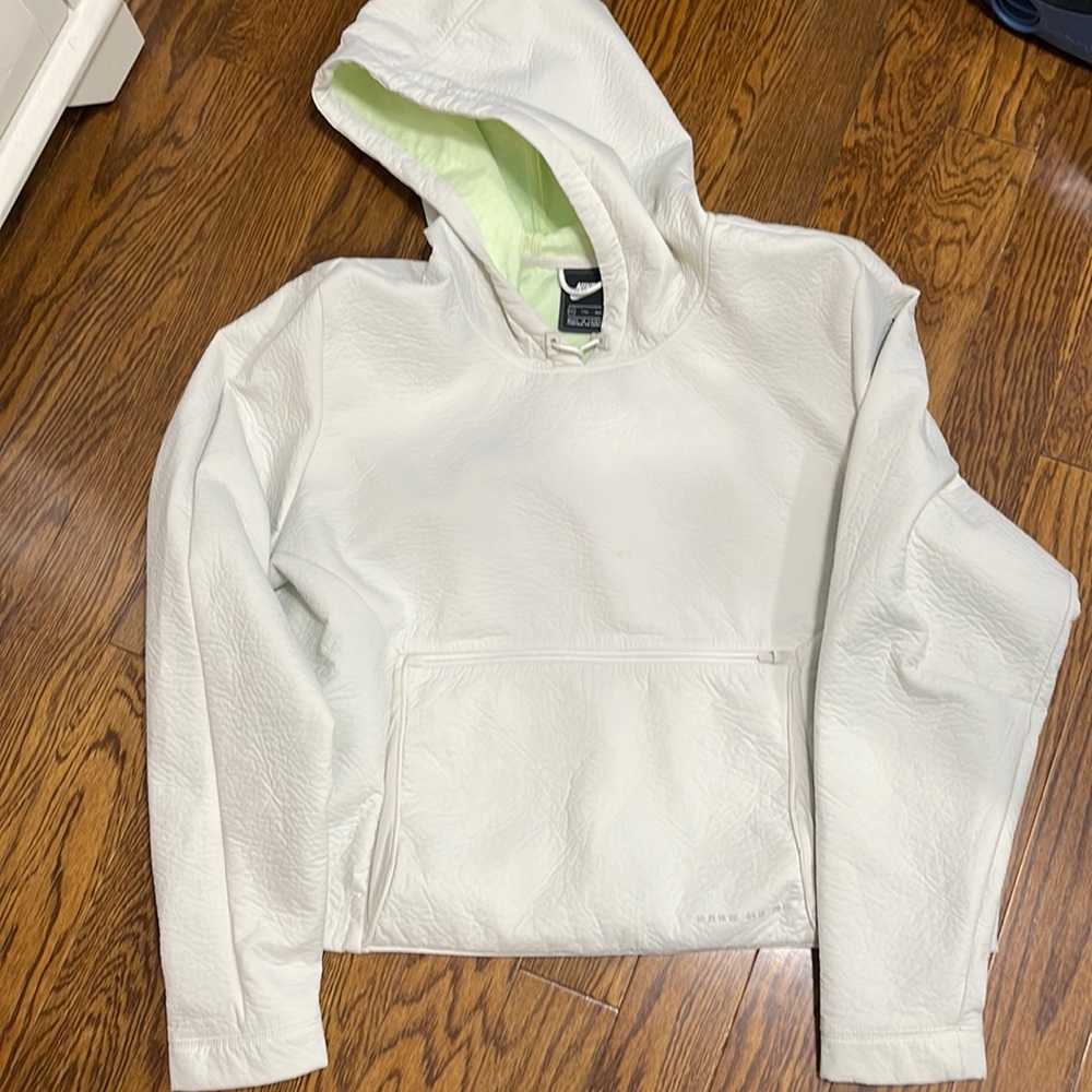 Waterproof hoodie turns into handbag